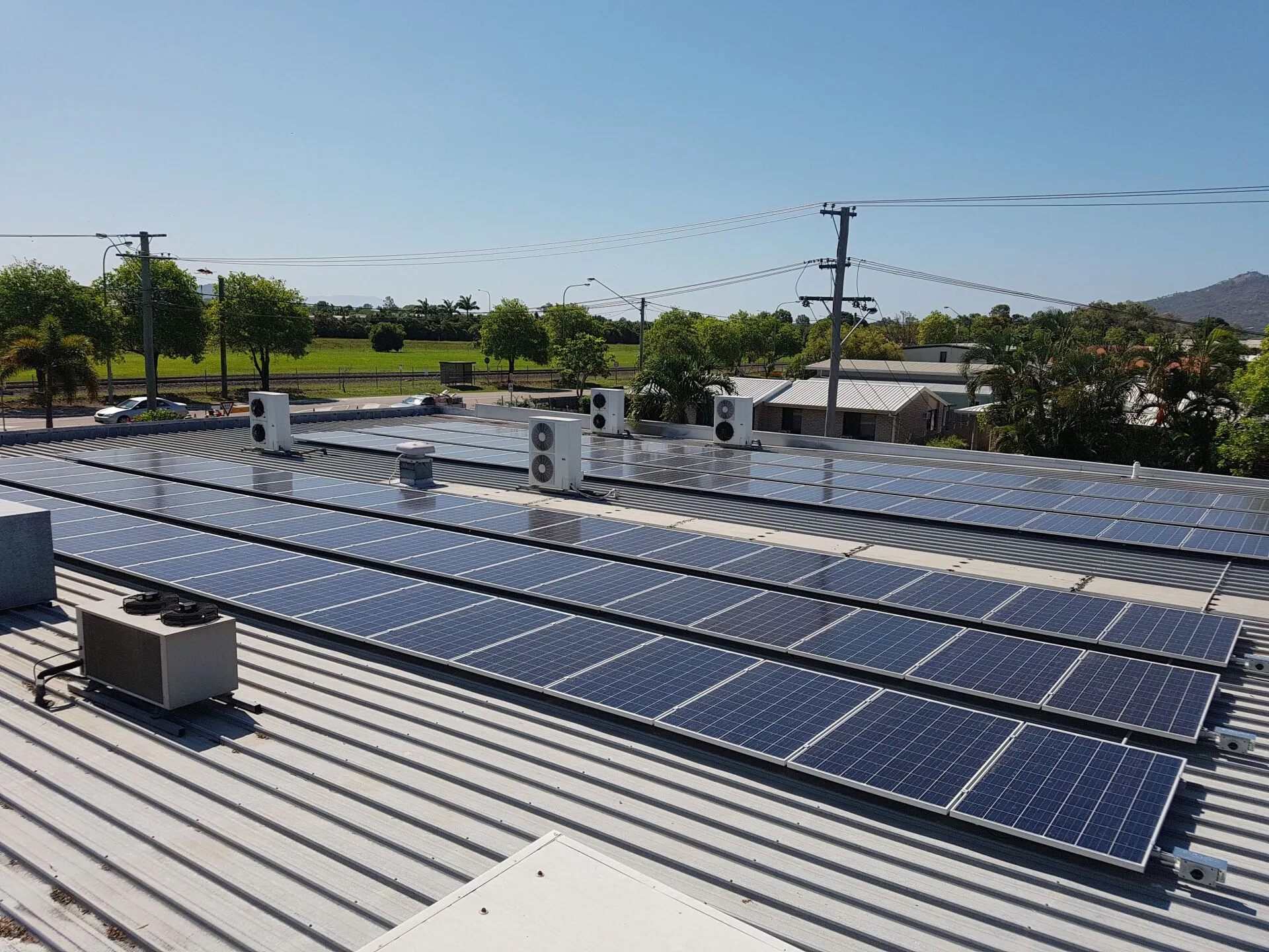 Large commercial rooftop solar array installed by On Point Solar in Townsville