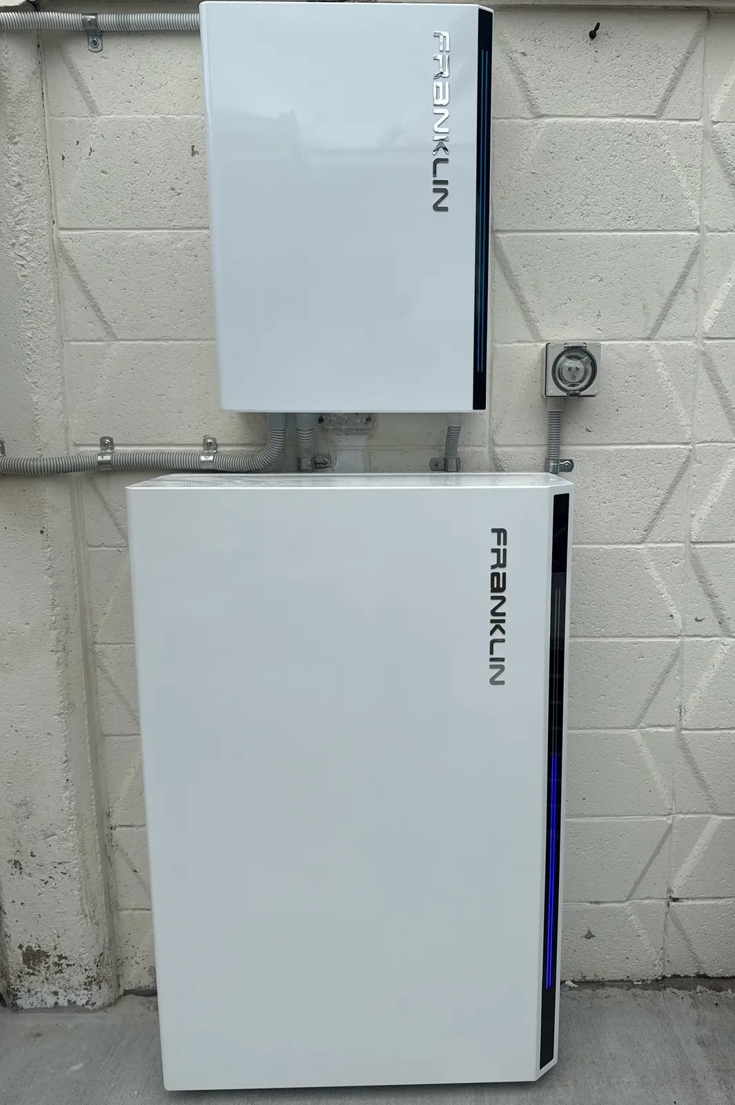 FranklinWH battery installation Townsville — two stacked aPower batteries fitted by On Point Solar at a local home