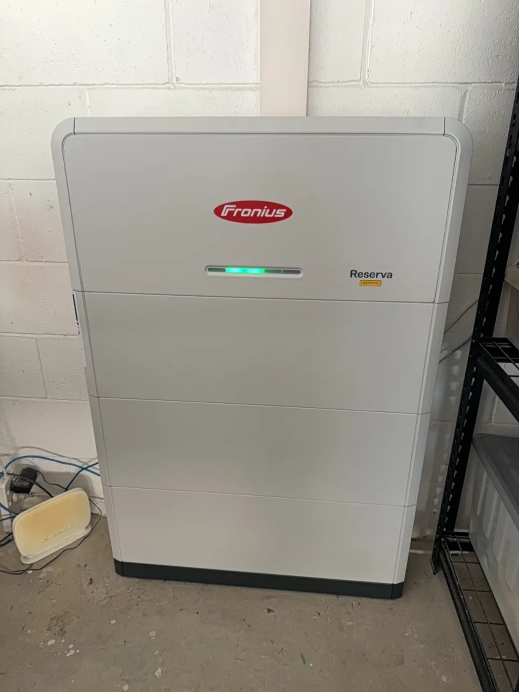 Fronius Reserva battery installed by On Point Solar in a Townsville garage