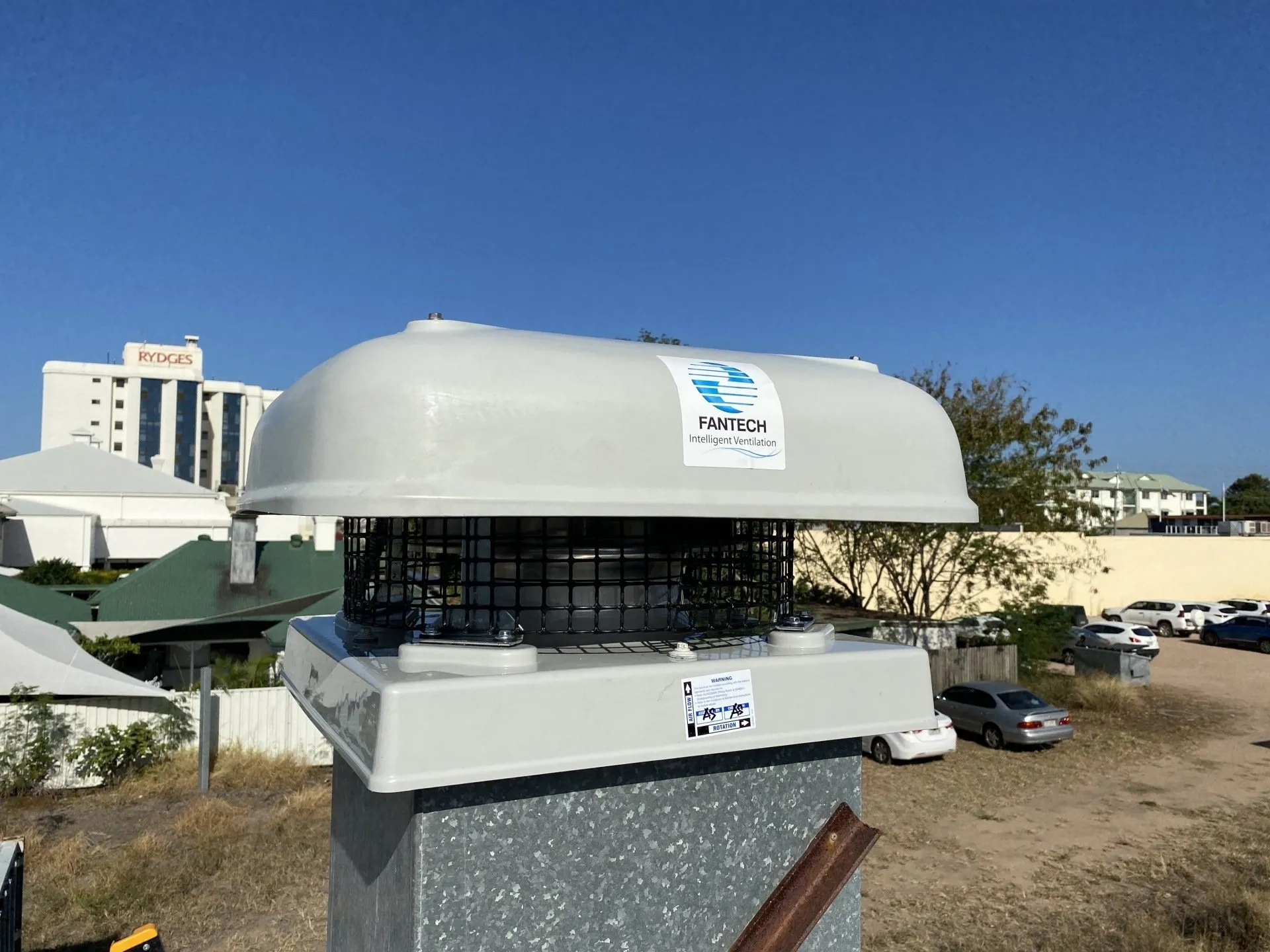Solar quote Townsville — On Point Solar & Electrical rooftop work under a clear North Queensland sky