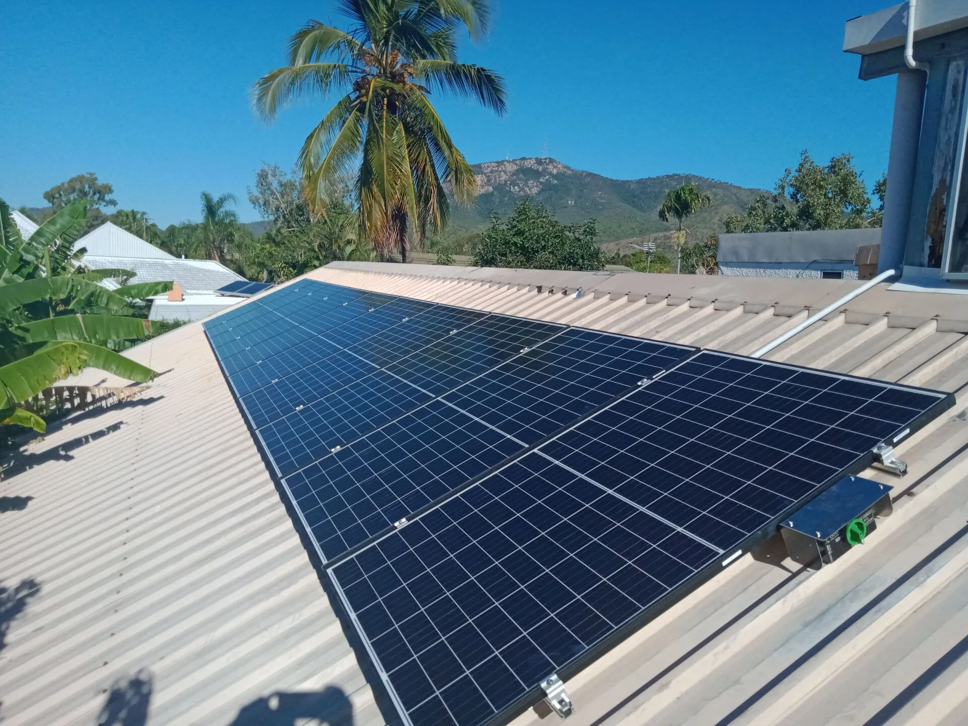 Tier-one solar panels installed on a Townsville tiled roof by On Point Solar